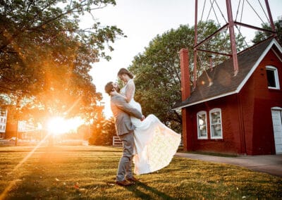 Married couple at Earle Brown Heritage Center in the sunset