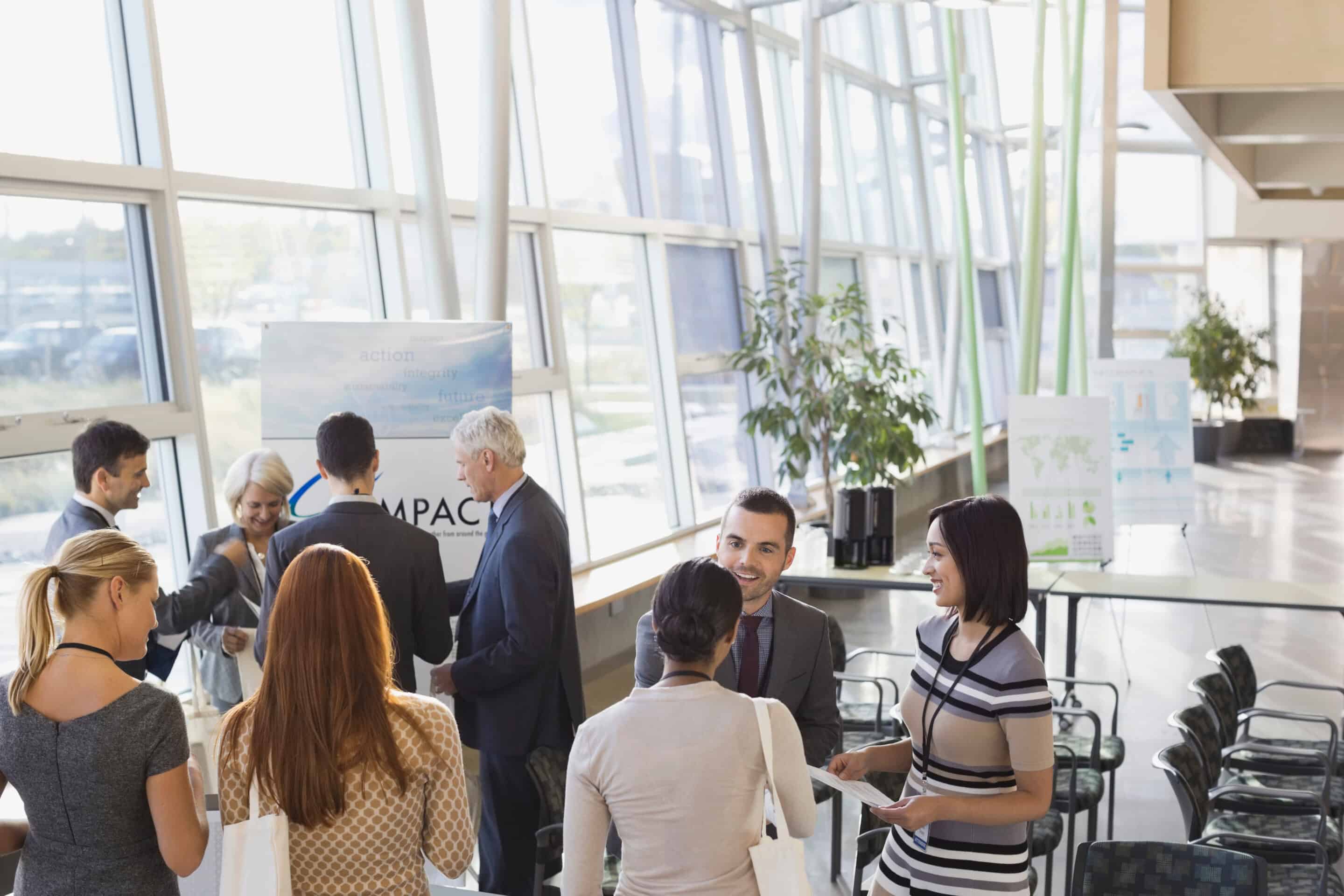 Business people attending conference