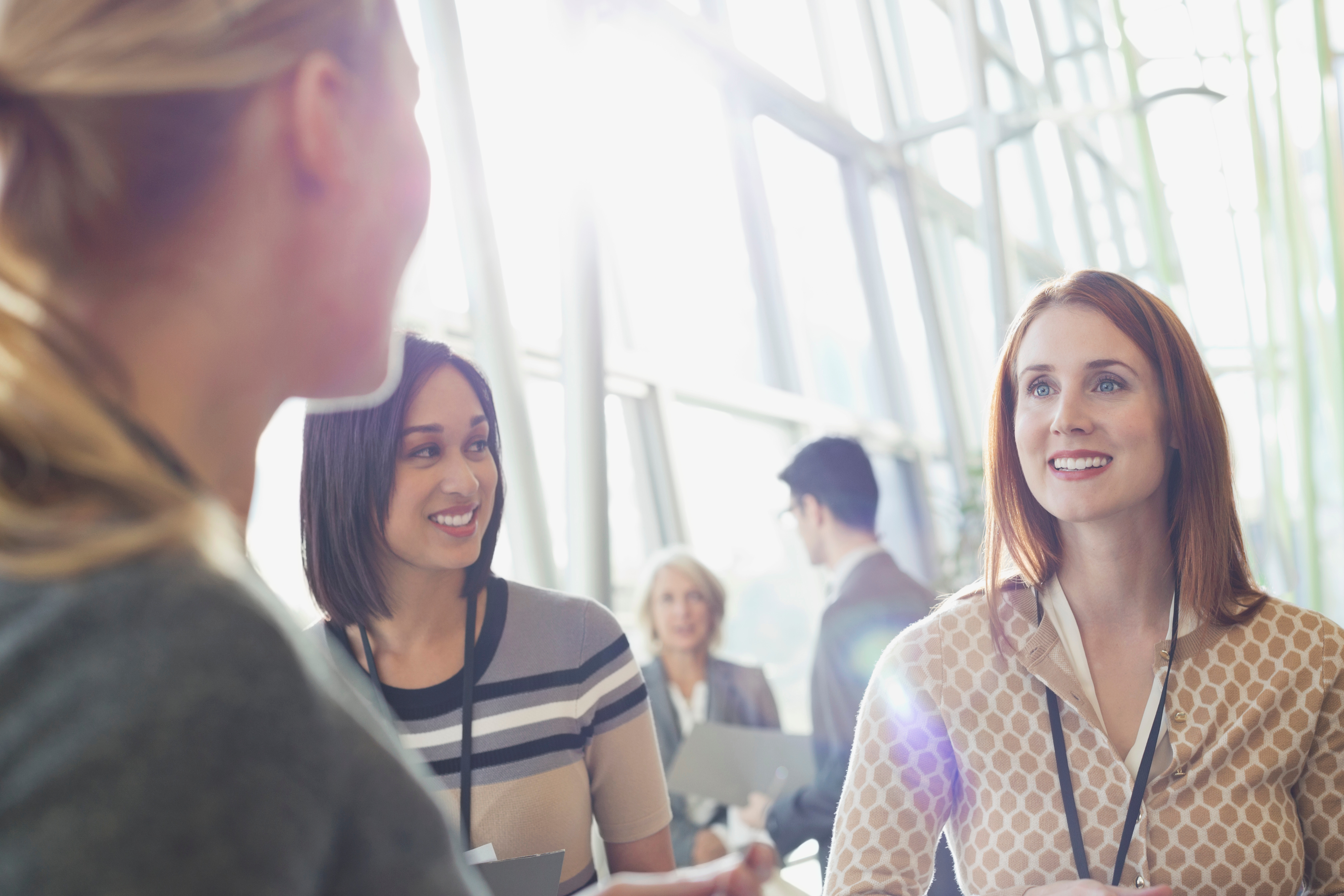 Businesswomen discussing in lobby