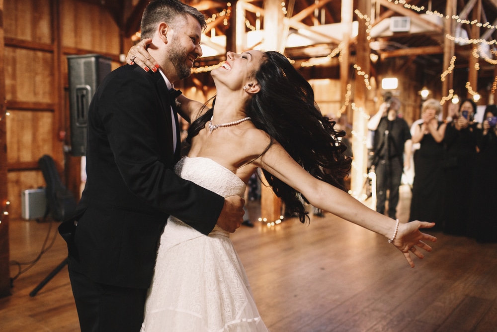 Bride and groom dancing together at a wedding reception